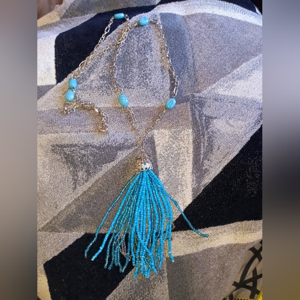 Blue, turquoise in color, necklace.